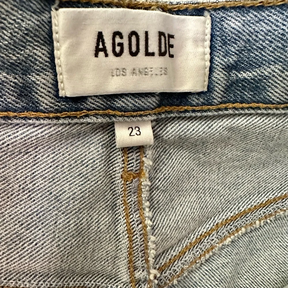 NWT Agolde Criss Cross Jean Mini Skirt Distressed Light Blue Frayed Hem Denim